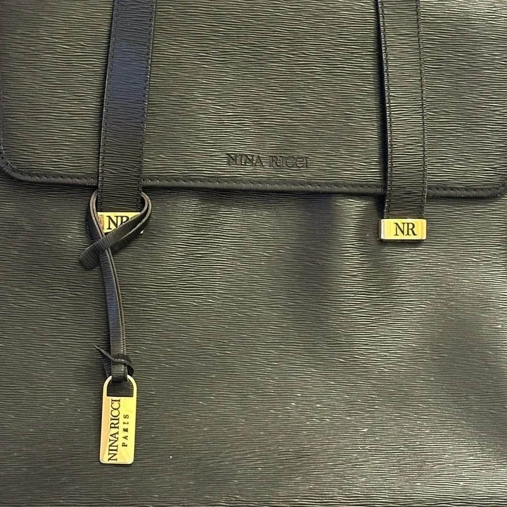 Nina Ricci Black Shoulder Bag with Structured Design and Gold Hardware
